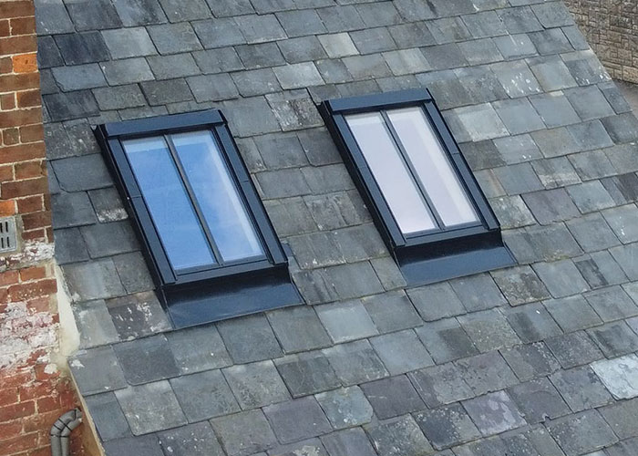 https://www.surreyloftladders.uk/wp-content/uploads/2026/09/roof_tile_solar_pane_cleaning_tile.jpg
